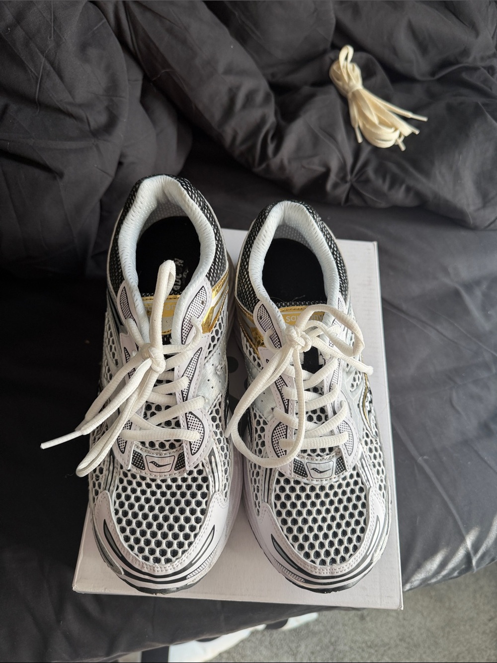 Saucony Kids White Black Sneakers with Gold Accents